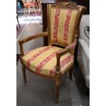 A French style giltwood framed fauteuil armchair, floral and foliate striped damask fabric