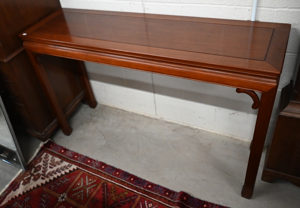 A 20th century Chinese stained hardwood console table, 138 cm wide x 40 cm deep x 86 cm high