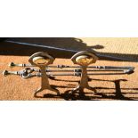 A Regency steel hearth tongs and poker set with brass handles to/w a pair of Arts & Crafts style