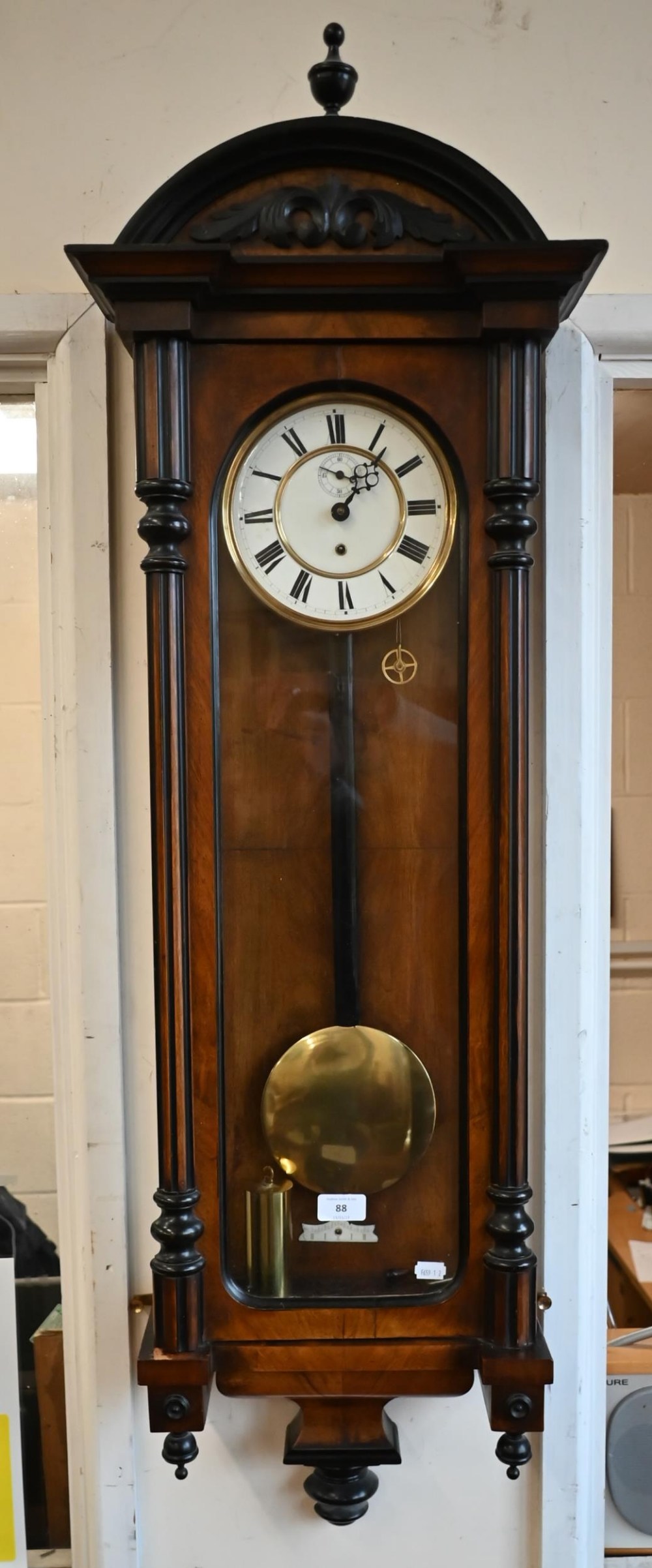 Vienna style walnut and ebonised wall clock c/w pendulum and key a/f, 120 cm high