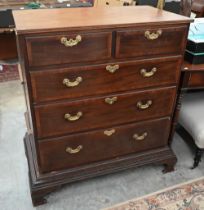 A 19th century mahogany chest of two short over three long graduating drawers with brass handles,