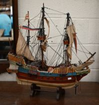 A scratch-built vintage wooden model of a 17th century three-masted galleon, 66 cm