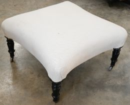 A Victorian foot stool of convexed square form with off-white linen upholstery and ebonised turned