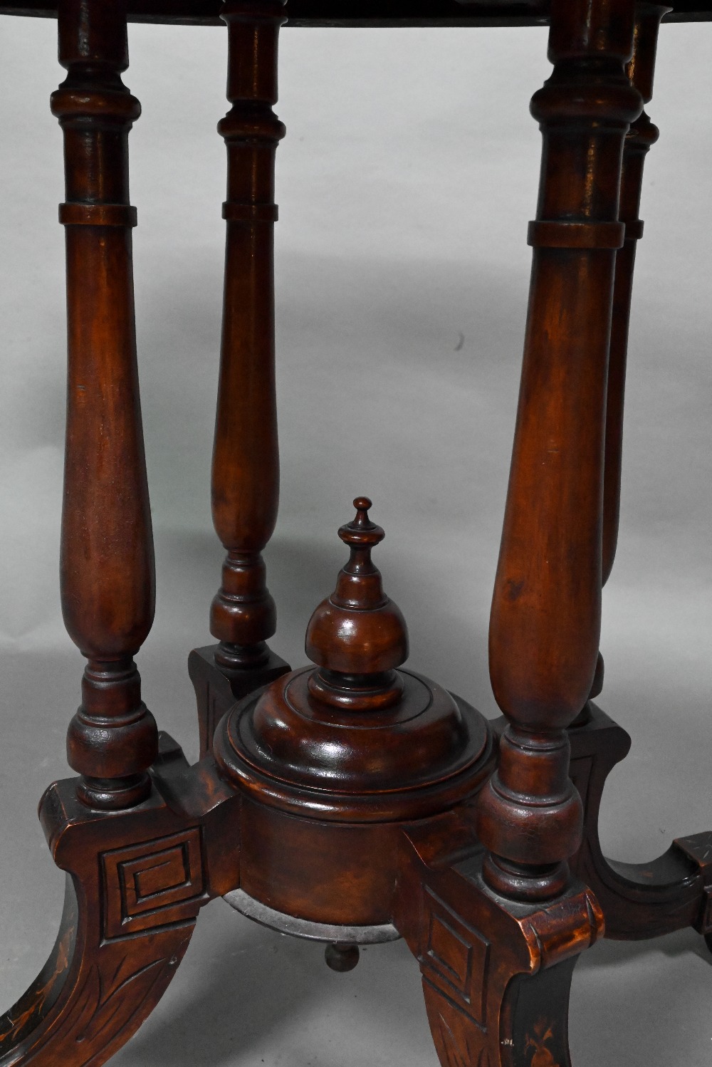 A Victorian inlaid figured walnut centre table, the oval top raised on four to swept legs, on - Image 5 of 6