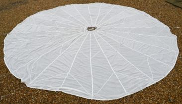 A military issue parachute canopy approx 6.5m diam (some losses at rim), not for use - suitable as