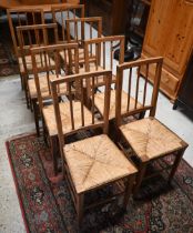 A matched set of eight rush-seated kitchen side chairs (8)