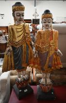 Two Burmese carved and painted wood figures, 105/99 cm high (2)