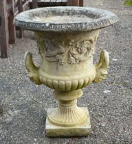 A large pair of weathered cast stone campagna urns, 80 cm h