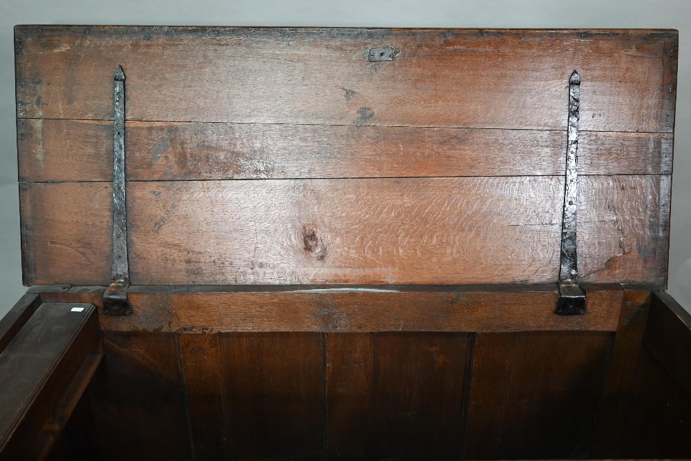 An 18th century oak mule chest, the three plank top over four fielded arched panels and three - Image 4 of 9