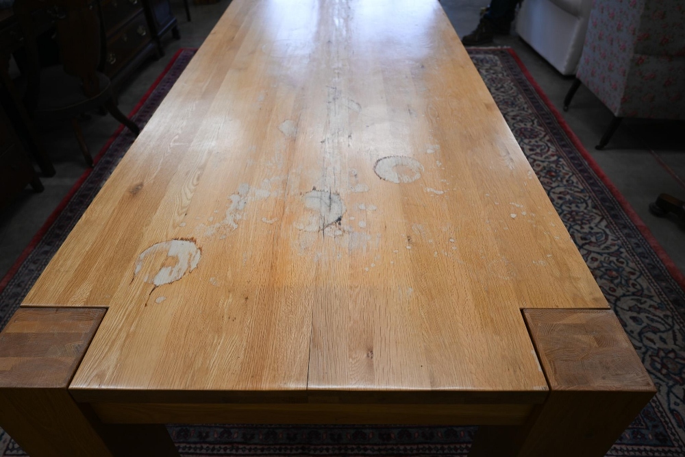 A large contemporary light oak corner-leg dining table, rectangular top with square supports ( - Image 3 of 5