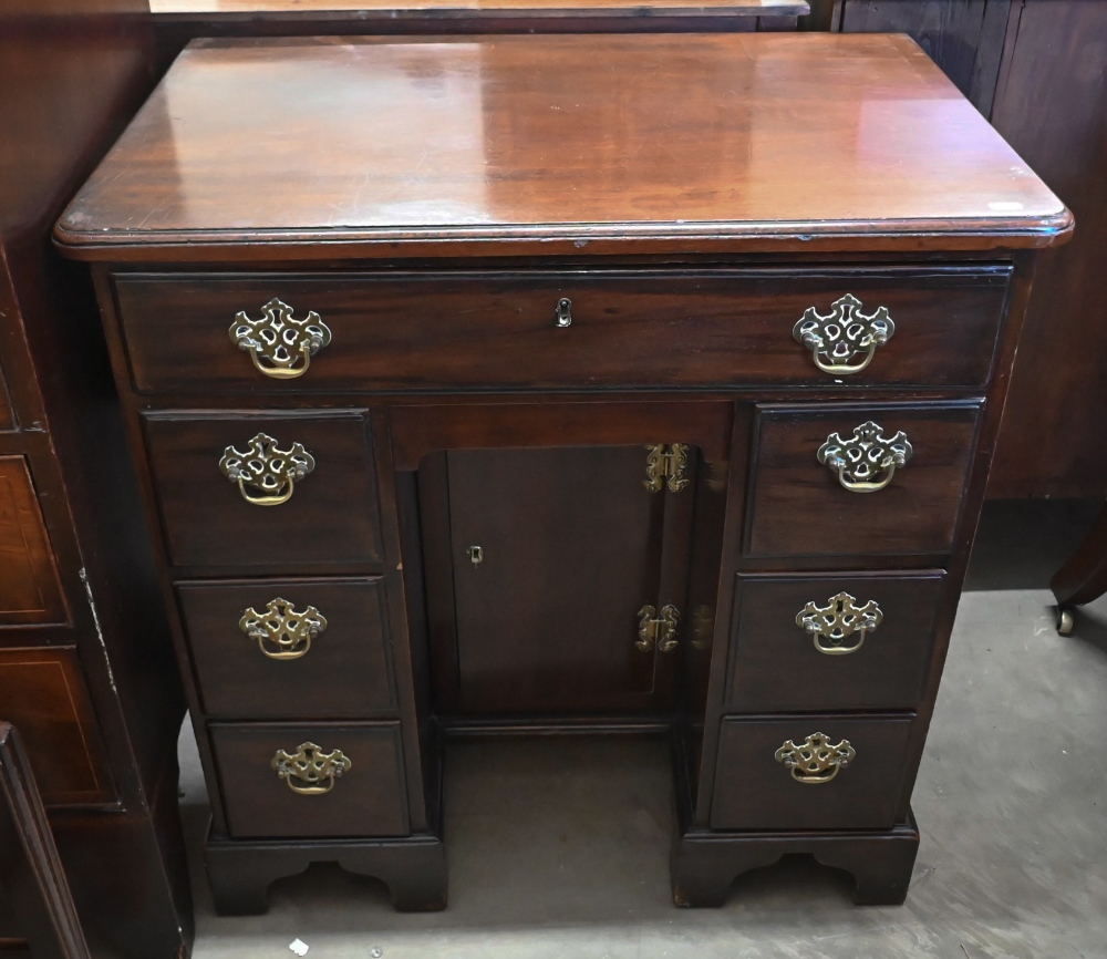 A George III mahogany kneehole desk with seven drawers and secret frieze drawer over recessed - Image 2 of 3