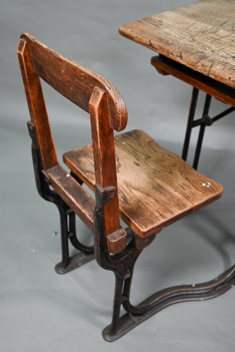 A Victorian cast iron and oak student/school desk, the slope top carved with multiple graffiti, - Image 2 of 7