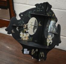 A Continental black lacquered, floral-printed and painted corner wall-bracket set with mirrors 42 cm