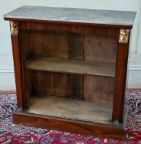 An Empire-style Egyptian Revival brass mounted rosewood low open bookcase, with later marble top, 76
