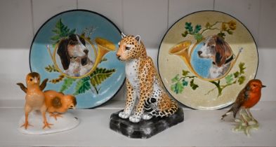 A Nymphenburg porcelain group of two chicks, a Halcyon Days Leopard, Goebbels Robin and a pair of