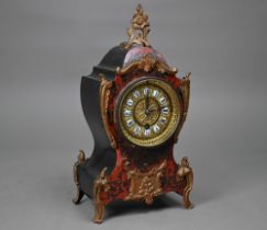 A late 19th century French Boulle mantel clock in the Rococo Revival manner with gilt metal mounts