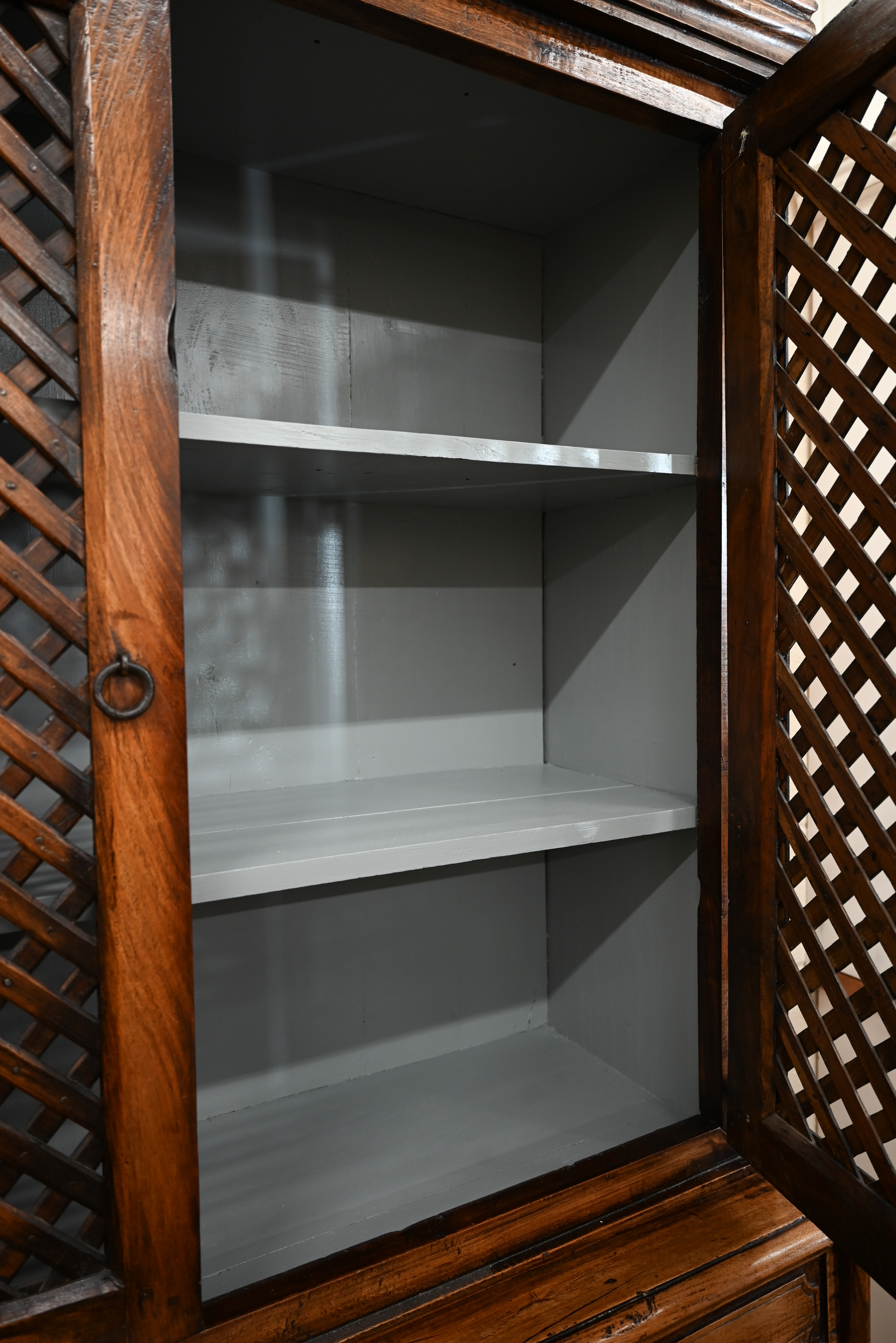 An Indian hardwood two part cabinet with open lattice panelled doors on base with two drawers and - Image 3 of 6