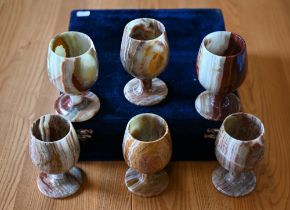 A cased set of six turned onyx goblets