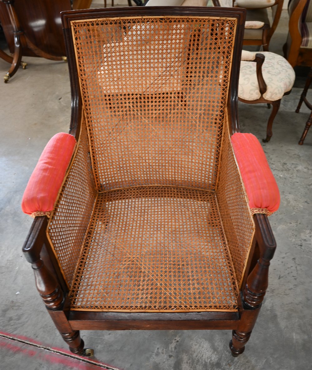 A mid 19th century mahogany framed bergere library chair with baluster turned supports and brass - Image 2 of 9