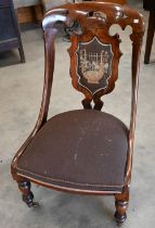Regency rosewood nursing chair with padded petit-point lyre design back
