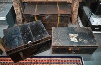 A stack of three antique and later japanned steel military uniform trunks, all a/f (3)