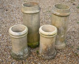 Two pairs of old weathered cylindrical chimney pots, 71 cm and 46 cm h, all a/f (4)