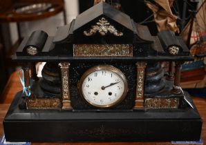 A large brass-mounted slate mantel clock with twin-train French movement 39 x 59 cm