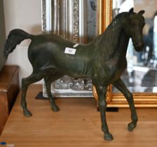 A Verdigris-patinated bronze horse, unsigned, 46 x 60 cm