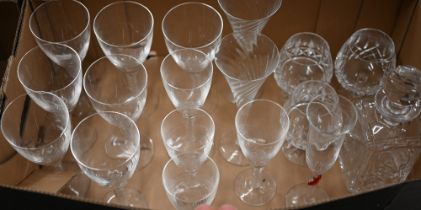 A set of seven Stuart crystal wine glasses with airtwist stems and four smaller matching glasses
