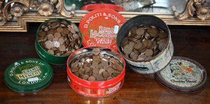 A large collection of copper half pennies, Edward VII-Elizabeth II, in three tins, in excess of 2,