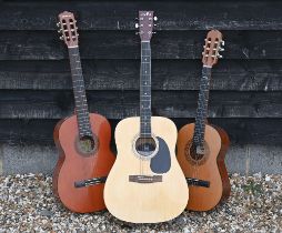 Three acoustic guitars