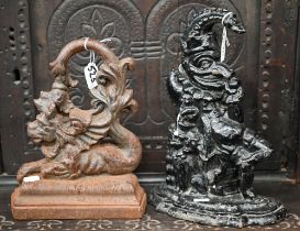 Two Victorian cast iron doorstops - Mr Punch and Merlion (lion with fish's tail) (2)