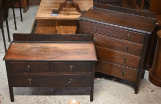 A 1930's oak chest of four long graduated drawers to/with a matching three drawer chest, reduced