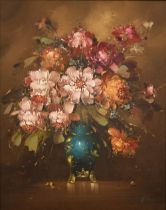 Continental school - Still life with flowers in a blue vase, oil on canvas, signed indistinctly,