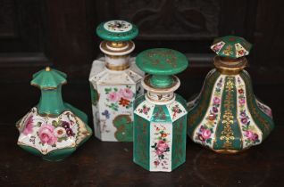 Four 19th century French floral-painted porcelain scent bottles and stoppers with green and gilt