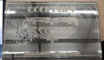 Decorative Art Deco style frameless 'cocktails' mirror, 138 x 85 cm, a/f