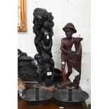 An African ebony figural carving 62 cm to/w a Southern African figure of a fisherman and two