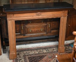 A Georgian style pine chimney piece, with applied mouldings and carved tablets, 138 cm w x 29 cm x