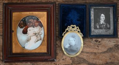 A brass-framed small photographic portrait of a lady to/w a cased photograph of an oil portrait