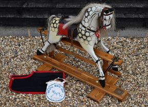 A painted dapple traditional rocking horse on hardwood frame with brass plaque 'Grandpa's Horse'