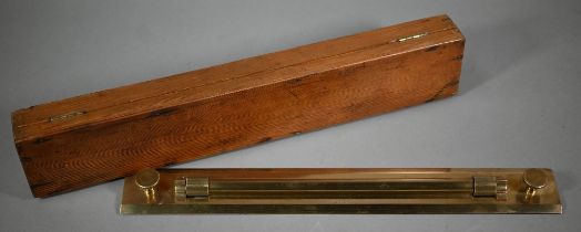 A vintage brass rolling ruler by UWW, Birmingham, 46 cm in stained pine case