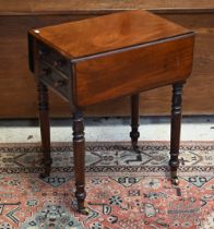 A Victorian mahogany drop leaf work table, with two drawers to one end opposing dummy drawer fronts,