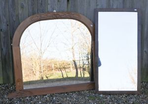 A carved pine framed over mantel mirror, 106 cm x 98 cm to/w a rectangular mahogany framed mirror,