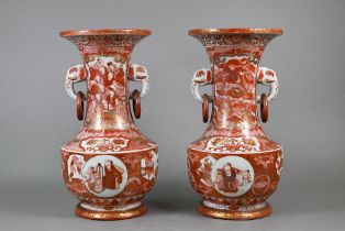 A pair of 19th century Japanese Kutani vases, Meiji period (1868-1912) with elephant mask loose ring