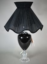 A Euroluce Collection (Italy) black glass table lamp, 48 cm with pleated shade