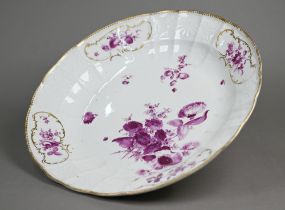A 19th century Meissen circular dish finely painted with puce floral sprays within bianco sopra