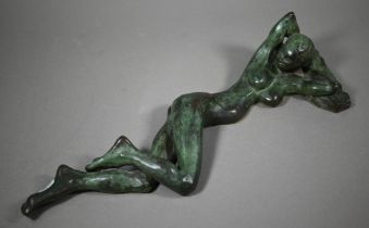 Charlotte Jackson - A verdigris patinated bronze sculpture of a reclining woman, 42 cm long