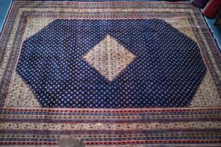 A contemporary central Persian Arak carpet, the predominantly blue ground with repeating design of