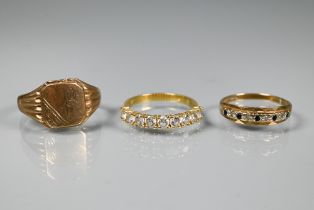 A 9ct yellow gold signet ring, size U, approx 3.6g to/w a white sapphire half eternity ring set