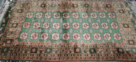 Indian green ground rug